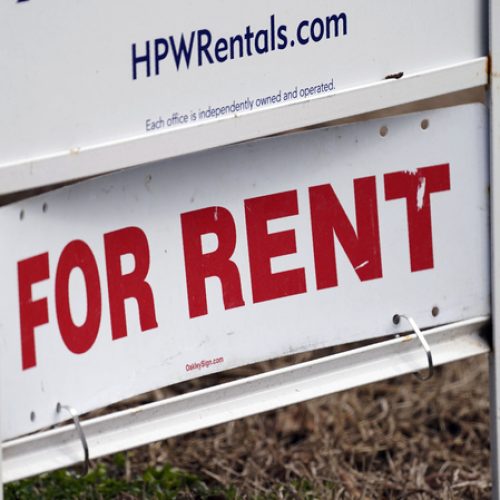 A "For Rent" sign is displayed along a neighborhood street in Mebane, N.C., Wednesday, Feb. 10, 2021. U.S consumers have so far defied higher prices for gas, food, and rent and have been spending more in 2022, providing crucial support to the economy. How long that can continue will be one of the key factors affecting the economy and inflation this year. (AP Photo/Gerry Broome)